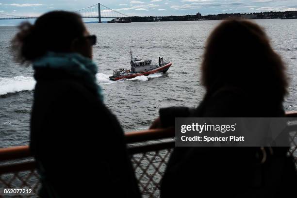 Coast Guard boat patrols in New York harbor on October 16, 2017 in New York City. The U.S. Department of Justice has claimed that New York City is...