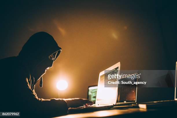 masked hacker - terrorism stock pictures, royalty-free photos & images
