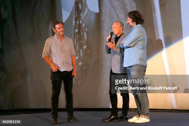 Stephane Celerier standing between producers of the movie Marc Missonnier and Olivier Delbosc present the "Knock" Paris Premiere at Cinema UGC...