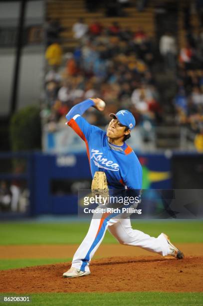Hyun Wook Jong of Korea pitches against Venezuela during the World Baseball Classic game at Dodger Stadium in Los Angeles, California on March 21,...