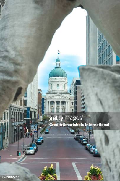 indiana state capitol building facade as seen from underneath the soldiers and sailors monument in indianapolis, indiana, usa - indiana state capitol building stock pictures, royalty-free photos & images