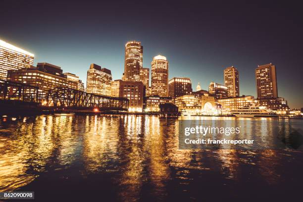 boston skyline at night - rowe's wharf stock pictures, royalty-free photos & images