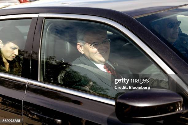 Senator Robert Menendez, a Democrat from New Jersey, sits in a vehicle while leaving federal court in Newark, New Jersey, U.S., Monday, Oct. 16 2017....