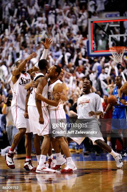 Andre Iguodala , Reggie Evans Lou WIlliams celebrate with Thaddeus Young of the Philadelphia 76ers after Young's game-winning shot over the Orlando...