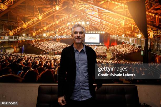 Alfonso Cuaron poses in front of the 2017 festival opening ceremony picture after "Bienvenida a Alfonso Cuaron" ceremony for 9th Film Festival...