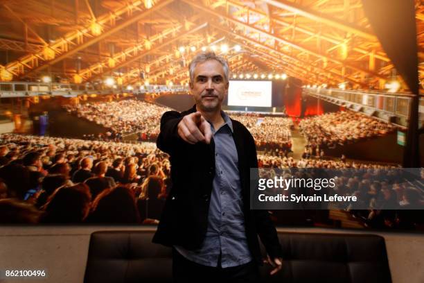 Alfonso Cuaron poses in front of the 2017 festival opening ceremony picture after "Bienvenida a Alfonso Cuaron" ceremony for 9th Film Festival...