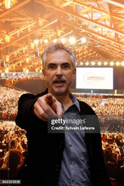 Alfonso Cuaron poses in front of the 2017 festival opening ceremony picture after "Bienvenida a Alfonso Cuaron" ceremony for 9th Film Festival...