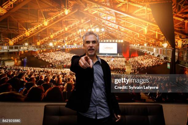 Alfonso Cuaron poses in front of the 2017 festival opening ceremony picture after "Bienvenida a Alfonso Cuaron" ceremony for 9th Film Festival...