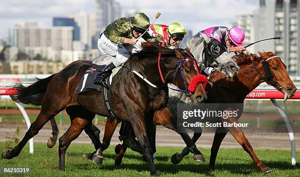 Brad Rawiller riding Brad Star wins the William Newton VC Handicap during the Anzac Day meeting at Flemington Racecourse on April 25, 2009 in...