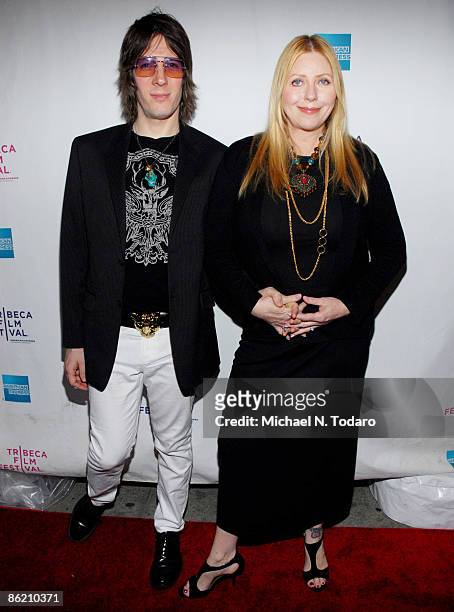 Jim Wallerstein and Bebe Buell attend the 8th Annual Tribeca Film Festival "Burning Down the House: The Story of CBGB" premiere at the AMC Village 7...