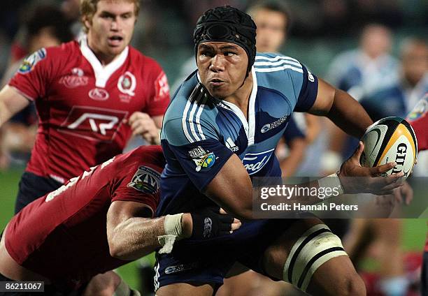 Peter Saili of the Blues looks to pass during the round 11 Super 14 match between the Blues and the Reds at North Harbour Stadium on April 25, 2009...