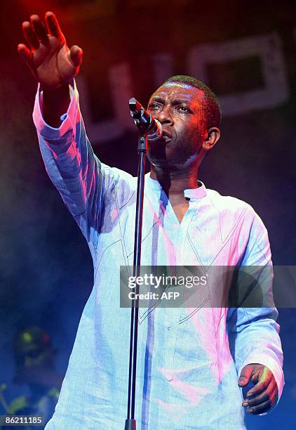 Senegalese singer Youssou N'Dour and the Super Etoile De Dakar perform late April 24,2009 in Abu Dhabi on the second night of the WOMAD world music...
