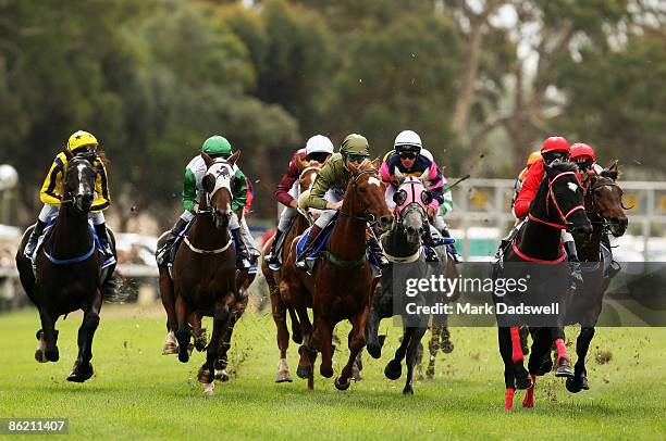 Jockey Louise Cooper riding Elquilita Lad sits midfield in the TB White & Sons Maiden Plate on April 25, 2009 in Avoca, Australia. All jockeys riding...