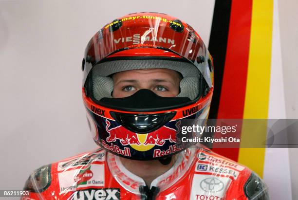 Stefan Bradl of Germany and Viessmann Kiefer Racing looks on from the pits during free practice for the 125cc race of the MotoGP World Championship...