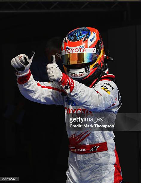 Second placed Timo Glock of Germany and Toyota celebrates in parc ferme after qualifying for the Bahrain Formula One Grand Prix at the Bahrain...