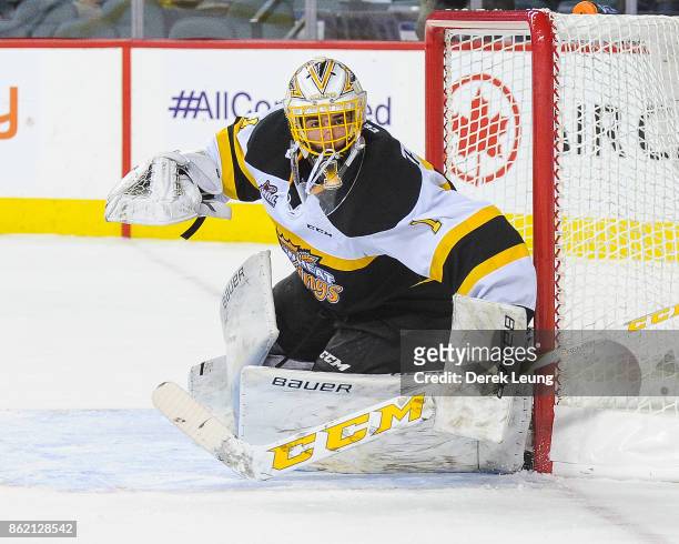 Logan Thompson of the Brandon Wheat Kings in action against the Calgary Hitmen during a WHL game at the Scotiabank Saddledome on October 8, 2017 in...