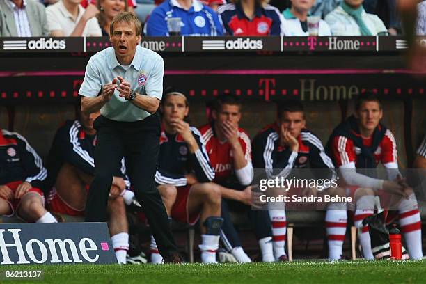 Head coach Juergen Klinsmann of Bayern reacts during the Bundesliga match between FC Bayern Muenchen and FC Schalke 04 at the Allianz Arena on April...