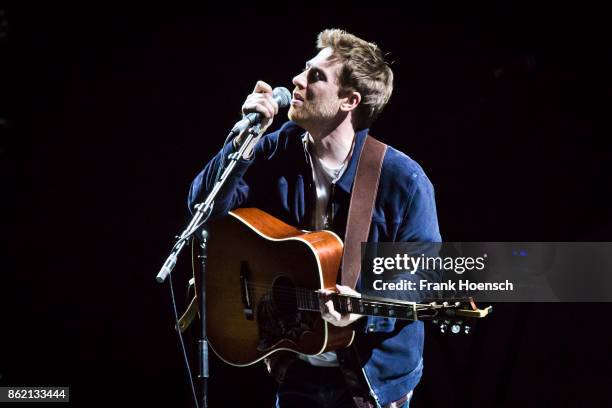 British singer Jamie Lawson performs live in support of James Blunt on stage during a concert at the Mercedes-Benz Arena on October 16, 2017 in...