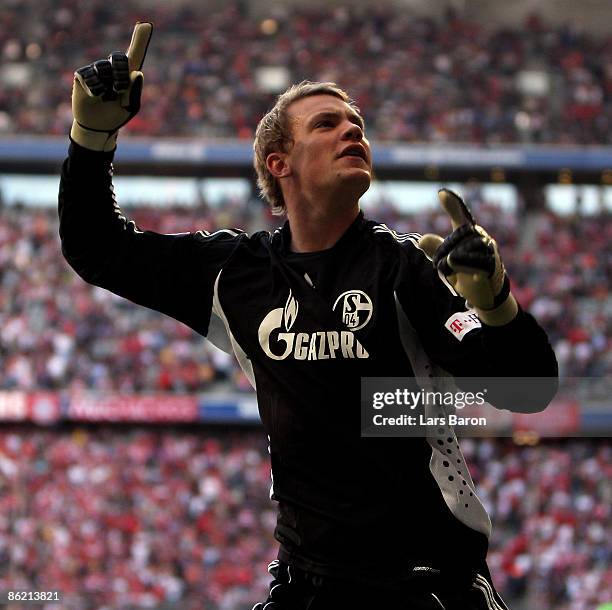 Goalkeeper Manuel Neuer of Schalke celebrates after winning the Bundesliga match between FC Bayern Muenchen and FC Schalke 04 at the Allianz Arena on...