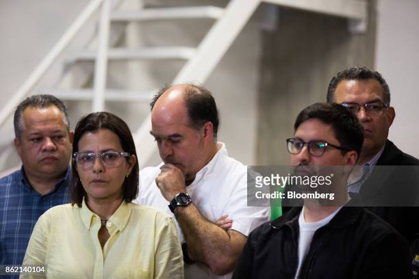 Members of the Democratic Unity Roundtable opposition party including Liliana Hernandez, deputy of the National Assembly, second left, Julio Borges,...
