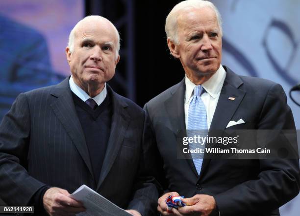 Sen. John McCain receives the the 2017 Liberty Medal from former Vice President Joe Biden at the National Constitution Center on October 16, 2017 in...