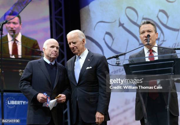 Sen. John McCain receives the the 2017 Liberty Medal from former Vice President Joe Biden as National Constitution Center President and CEO Jeffrey...