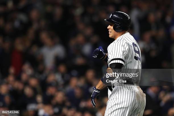 Aaron Judge of the New York Yankees celebrates hitting a 3-run home run against the Houston Astros during the fourth inning in Game Three of the...