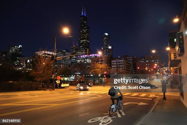 Dusk descends on the city's skyline on October 16, 2017 in Chicago, Illinois. The U.S. Justice Department has accused four cities including Chicago,...