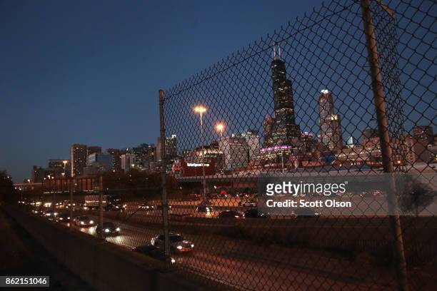 Dusk descends on the city's skyline on October 16, 2017 in Chicago, Illinois. The U.S. Justice Department has accused four cities including Chicago,...