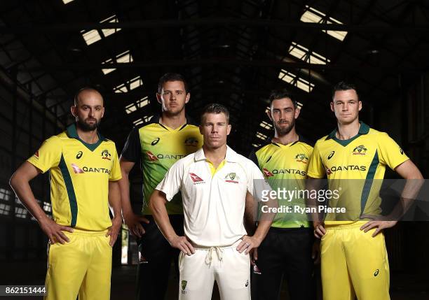 Australian Cricketers Nathan Lyon, Josh Hazlewood, David Warner, Glenn Maxwell and Peter Handscomb pose during the Australian Cricket Team ASICS Kit...