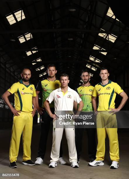 Australian Cricketers Nathan Lyon, Josh Hazlewood, David Warner, Glenn Maxwell and Peter Handscomb pose during the Australian Cricket Team ASICS Kit...
