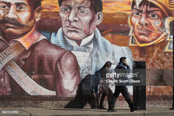 Mural celebrating Mexican history is painted on a wall along a commercial strip in the predominately Mexican Little Village neighborhood on October...