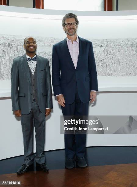 Artist Stephen Wiltshire and CEO of Empire Realty Trust, Anthony E. Malkin attend Empire State Building as it unveils commissioned cityscape by...