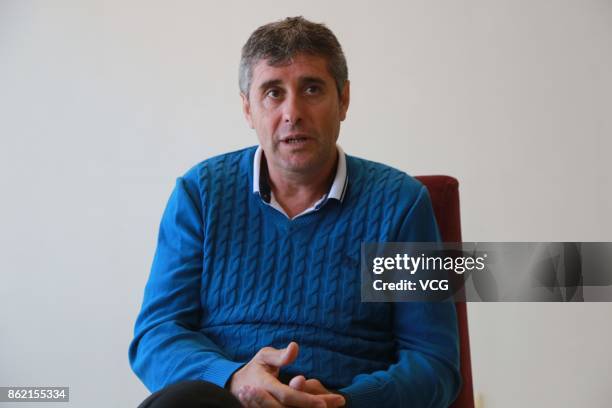 Juan Ramon Lopez Caro, head coach of Dalian Yifang F.C., receives an interview on October 16, 2017 in Dalian, Liaoning Province of China.