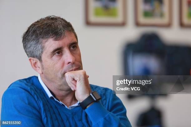 Juan Ramon Lopez Caro, head coach of Dalian Yifang F.C., receives an interview on October 16, 2017 in Dalian, Liaoning Province of China.