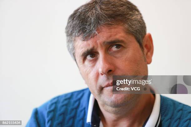 Juan Ramon Lopez Caro, head coach of Dalian Yifang F.C., receives an interview on October 16, 2017 in Dalian, Liaoning Province of China.