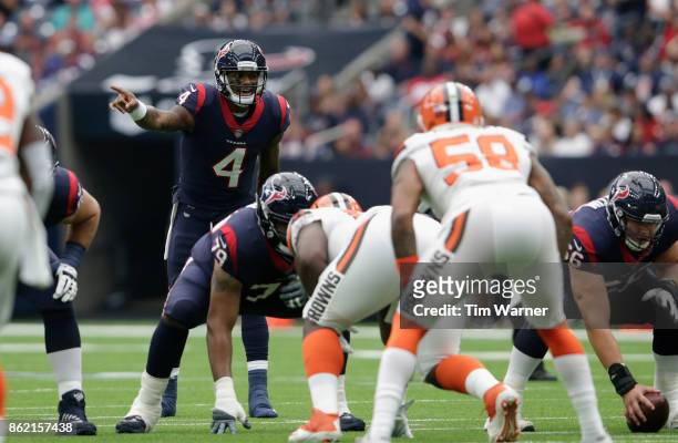 Deshaun Watson of the Houston Texans calls signals from the line of scrimmage in the first quarter against the Cleveland Browns at NRG Stadium on...