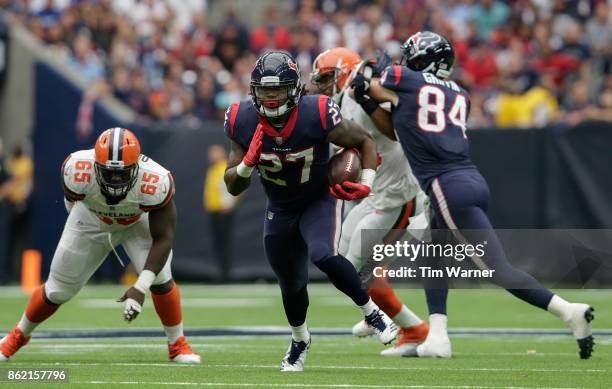 Onta Foreman of the Houston Texans runs the ball in the second quarter against the Cleveland Browns at NRG Stadium on October 15, 2017 in Houston,...