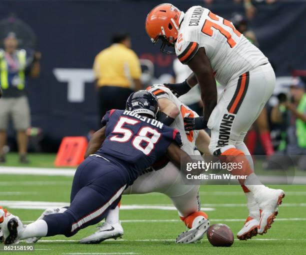 Lamarr Houston of the Houston Texans sacks Kevin Hogan of the Cleveland Browns forcing a fumble in the second half at NRG Stadium on October 15, 2017...