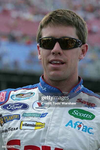 Carl Edwards, driver of the Save-A-Lot Ford, looks on before the NASCAR Nationwide Series Aaron's 312 at Talladega Superspeedway on April 25, 2009 in...