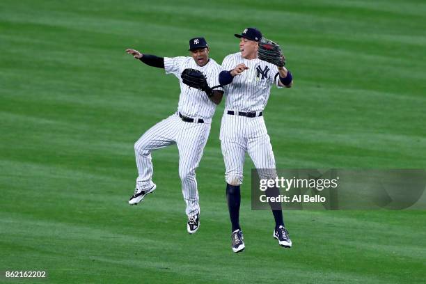 Aaron Judge of the New York Yankees celebrates with Aaron Hicks after defeating the Houston Astros in Game Three of the American League Championship...