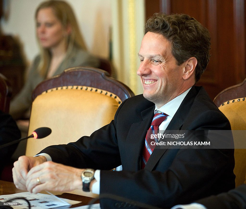 Tim Geithner US Treasury Secretary Tim Geithner laughs at the start of a meeting ...