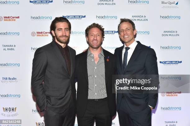 Actor Jake Gyllenhaal, Event co-chair, Marine veteran, Founder of Headstrong Zach Iscol and Host of "Late Night with Seth Meyers" Seth Meyers attend...