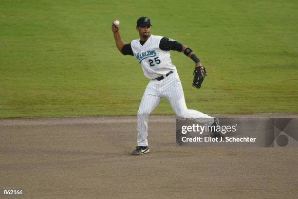 First Baseman Derrek Lee of the Florida Marlins throws the ball against the Detroit Tigers during the MLB game at Pro Player Stadium in Miami,...