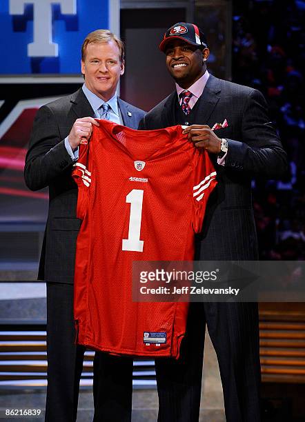 Commissioner Roger Goodell poses with with San Francisco 49ers draft pick Michael Crabtree at Radio City Music Hall for the 2009 NFL Draft on April...