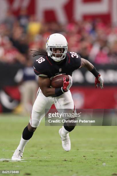 Running back Andre Ellington of the Arizona Cardinals rushes the football during the NFL game against the Tampa Bay Buccaneers at the University of...
