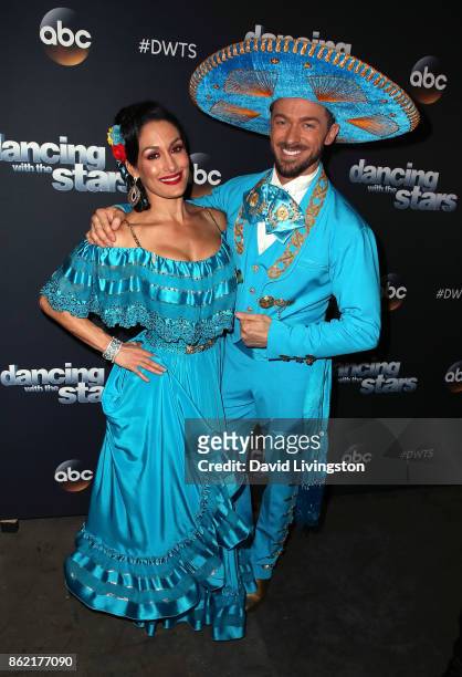 Professional wrestler Nikki Bella and dancer Artem Chigvintsev pose at "Dancing with the Stars" season 25 at CBS Televison City on October 16, 2017...
