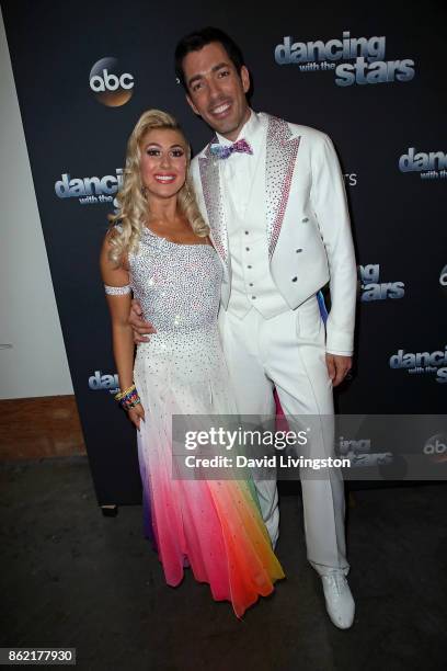 Personality Drew Scott and dancer Emma Slater pose at "Dancing with the Stars" season 25 at CBS Televison City on October 16, 2017 in Los Angeles,...