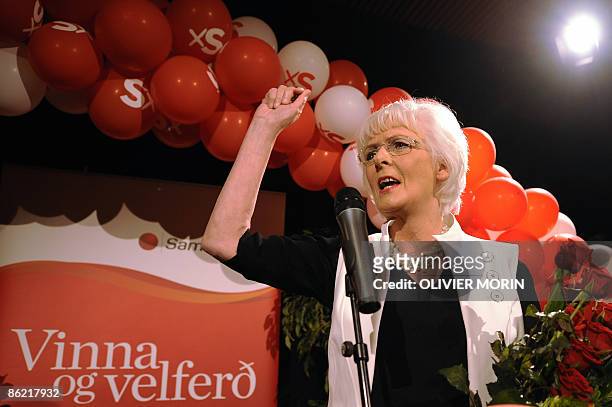 Leader of Social-Democrate Party and Prime Minister Johanna Sigurdardottir celebrates the victory with her teammates at the elections on April 25,...
