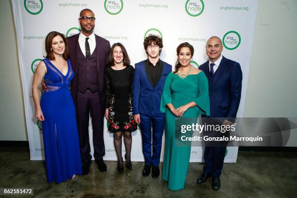 Camille Zamora, Andre Brown, Monica Yunus with Lukas Barwinski-Brown during the Sing for Hope Gala 2017 at Tribeca Rooftop on October 16, 2017 in New...